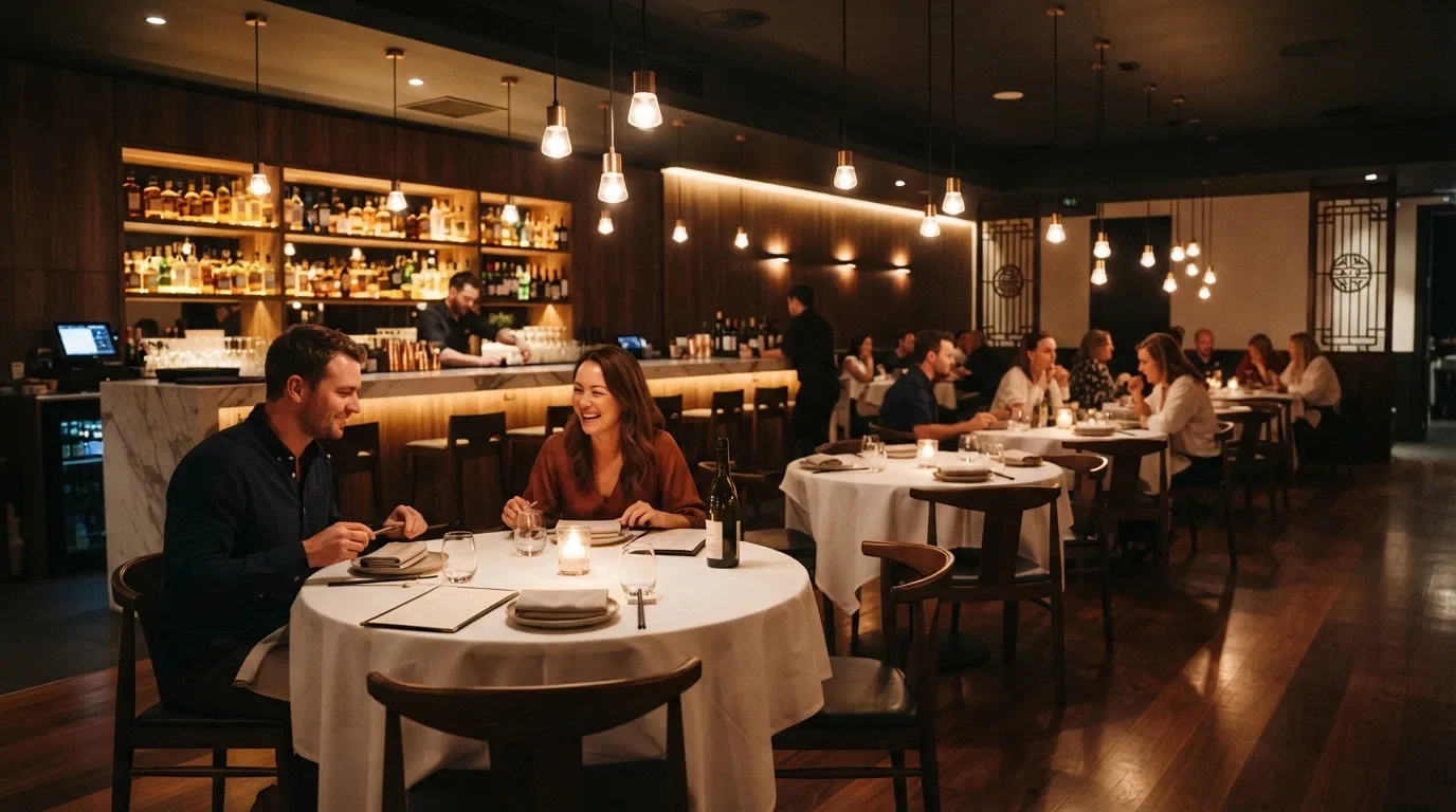 Natural Nine restaurant interior at Casino Canberra with private dining tables and a bar backdrop